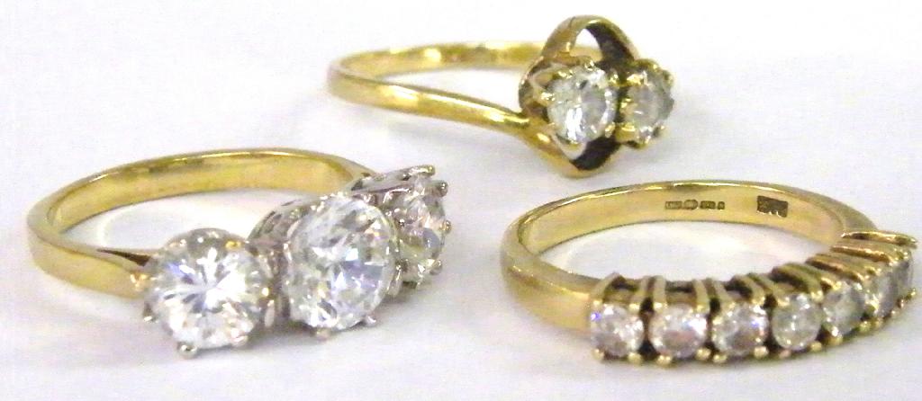 Appraisal: ct cz three stone ring ct crossover ring and a