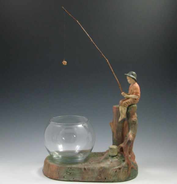 Appraisal: Weller Woodcraft Muskota Fisher Boy on Fish Bowl Base marked