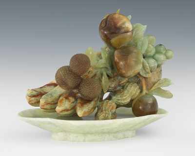 Appraisal: A Chinese Large Carved Jade Fruit Bowl with Fruits and