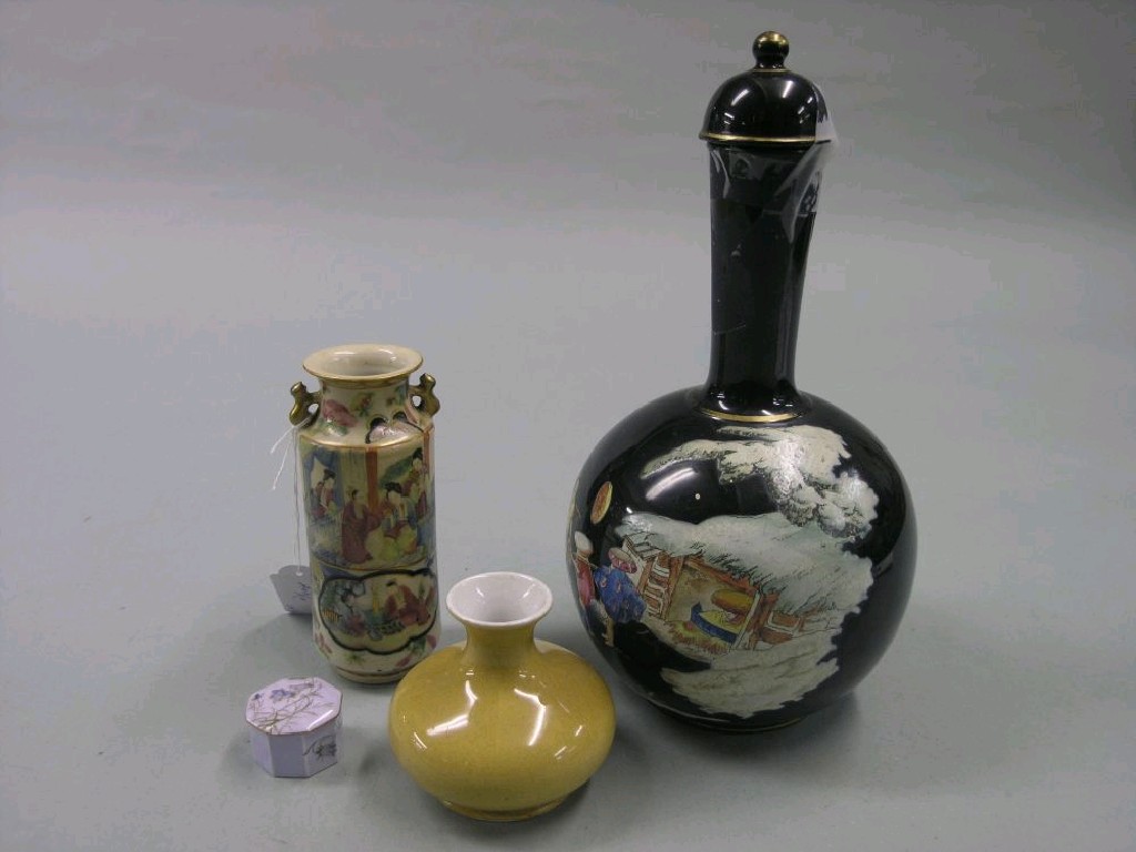 Appraisal: A miniature Royal Worcester pot and cover octagonal shape painted