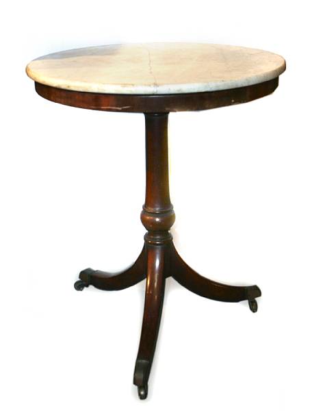 Appraisal: A mahogany occasional table with circular marble top height in