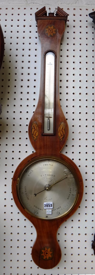 Appraisal: A George III mahogany wheel barometer with broken arch pediment