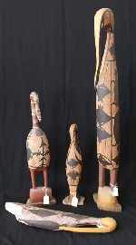 Appraisal: Carved and Painted Bird Sculptures ochre on carved wood cm