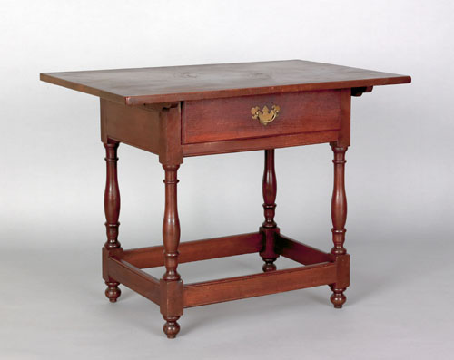 Appraisal: Pennsylvania walnut tavern table ca the rectangular top overhanging a