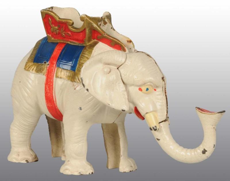 Appraisal: Cast Iron Elephant Pull Tail Mechanical Bank Description Manufactured by