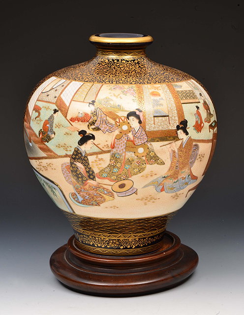 Appraisal: Large Japanese satsuma ovoid vasecirca Geisha in an interior playing