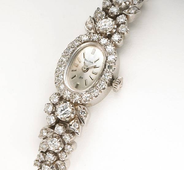 Appraisal: Bulova A lady's diamond fourteen and ten karat white gold