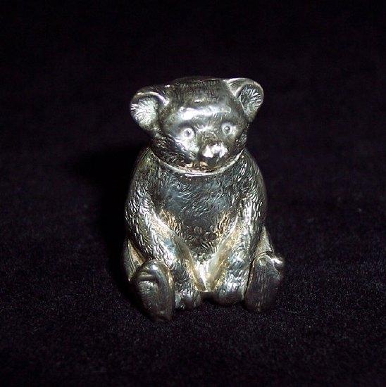 Appraisal: A seated bear menu holder Birmingham cm high