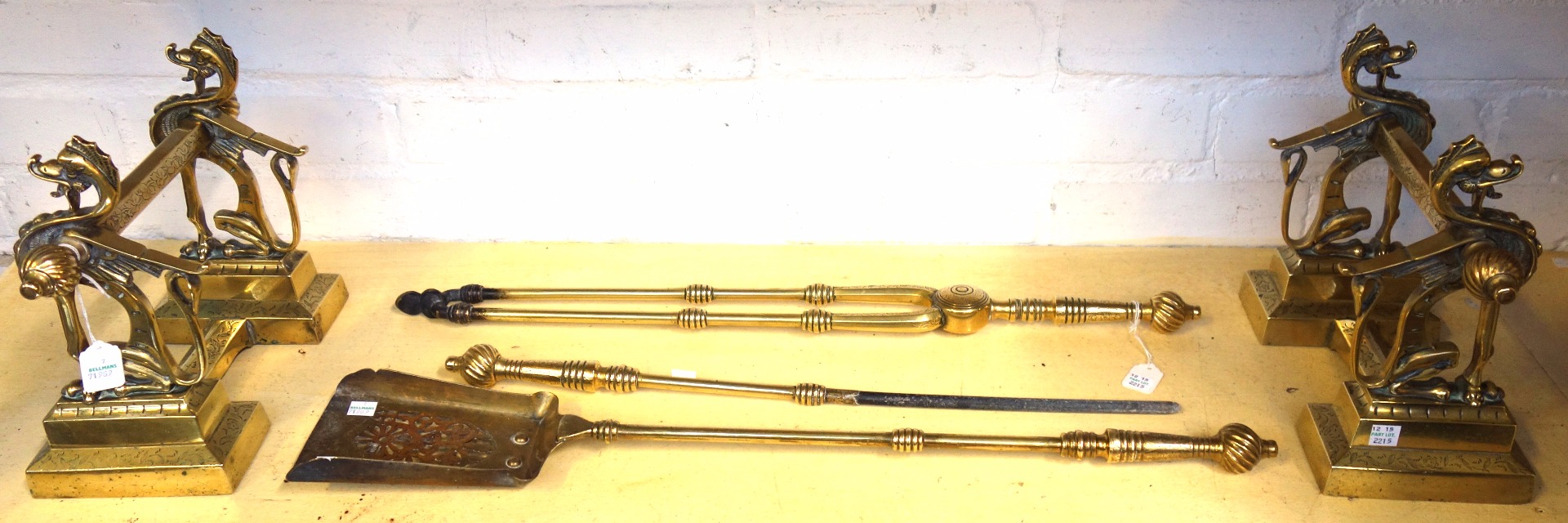 Appraisal: A set of three Victorian brass fire irons with poker