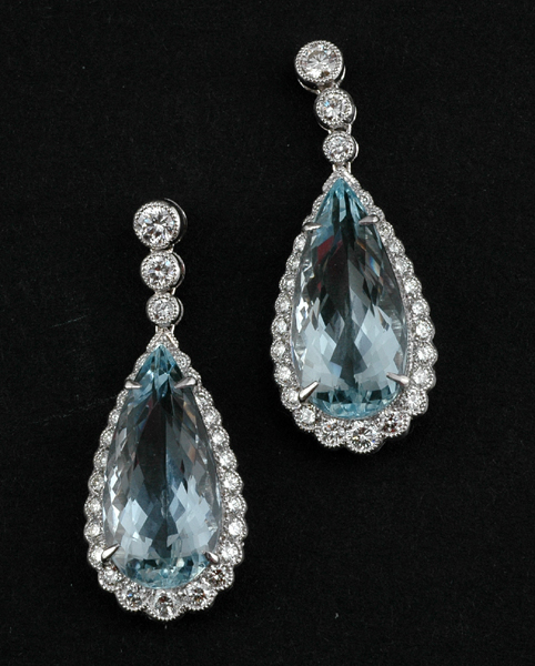 Appraisal: A PAIR OF AQUAMARINE AND DIAMOND DROP EARRINGS Each set