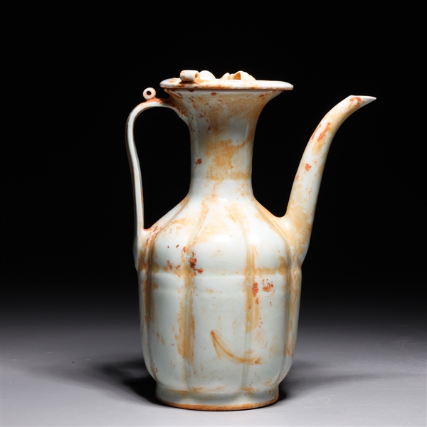 Appraisal: Chinese Ming style celadon glazed porcelain ewer with molded designs