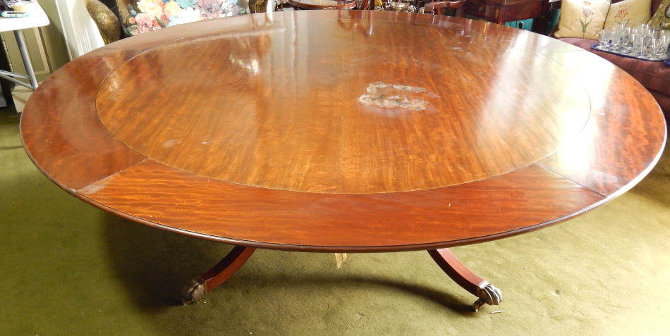 Appraisal: A mahogany dining table in Regency style the circular top