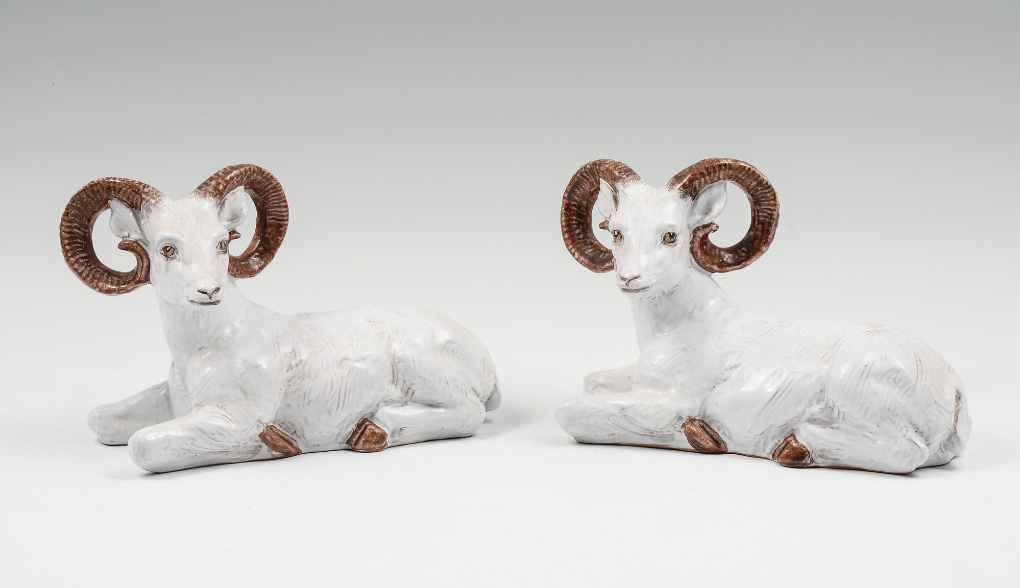 Appraisal: PAIR OF ITALIAN GLAZED TERRACOTTA BIGHORN SHEEP Hand-crafted Italian Terracotta