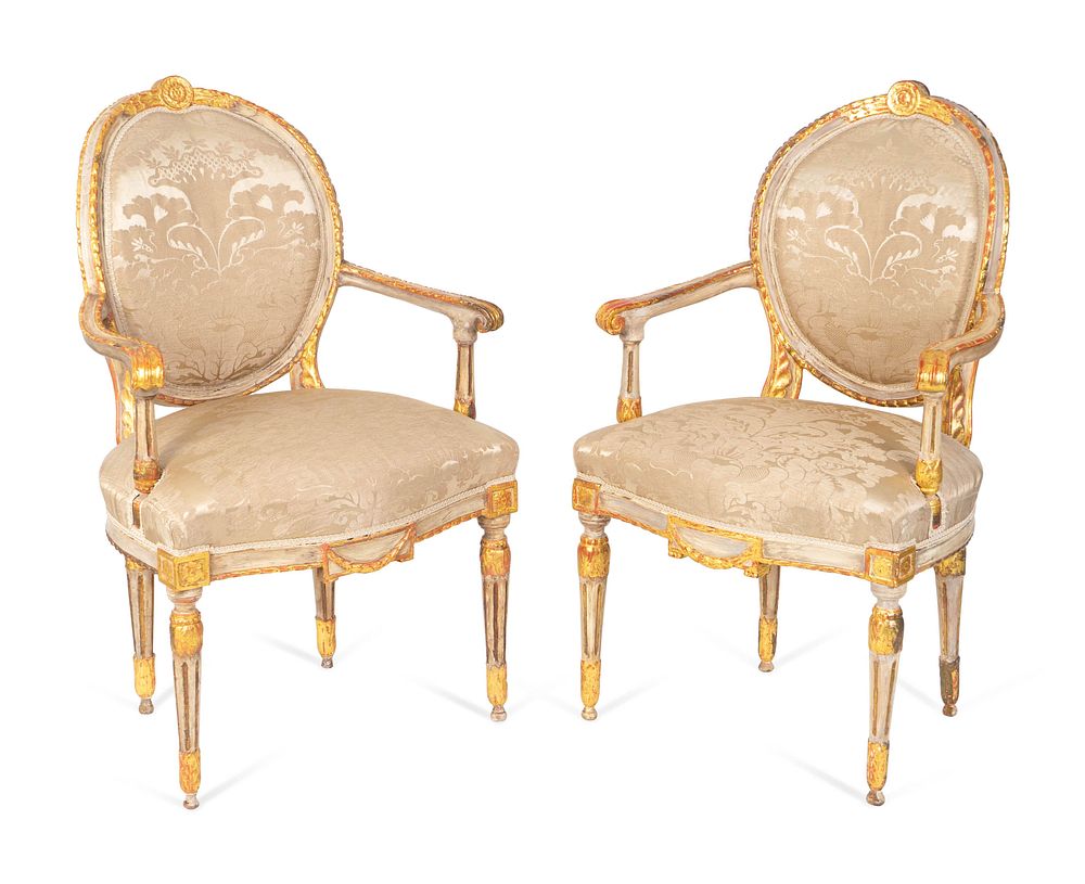 Appraisal: A Pair of Italian Neoclassical Painted and Parcel Gilt Armchairs