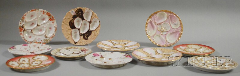 Appraisal: Eleven Assorted European Gilt and Hand-painted Porcelain Oyster Plates including