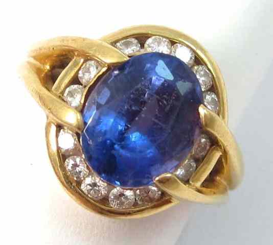 Appraisal: TANZANITE DIAMOND AND YELLOW GOLD RING k gold set with