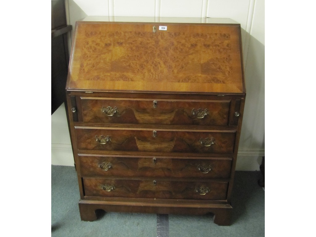 Appraisal: Reproduction walnut writing bureau and a mahogany display cabinet