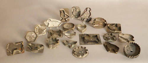 Appraisal: Twenty-two tinned sheet iron cookie cutters