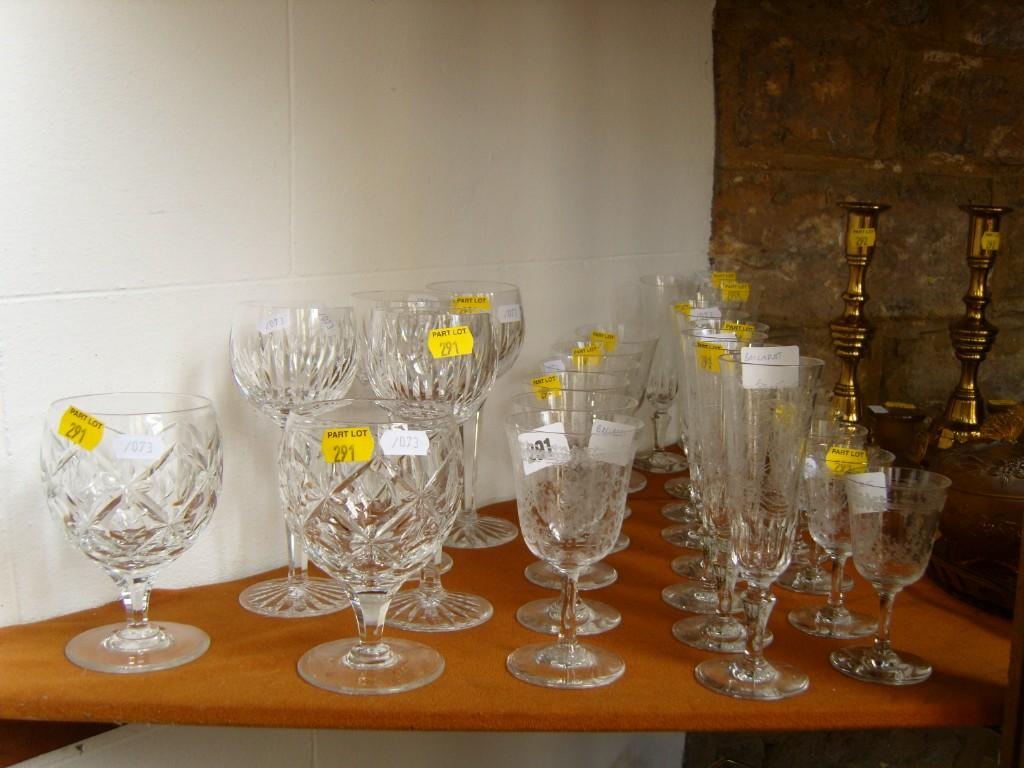 Appraisal: A collection of Baccarat engraved glasses comprising champagne flutes stem