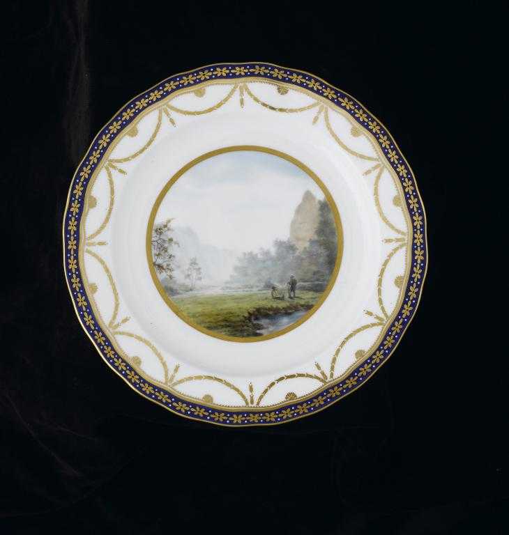 Appraisal: A CROWN DERBY PLATE painted by Edwin Trowell with two