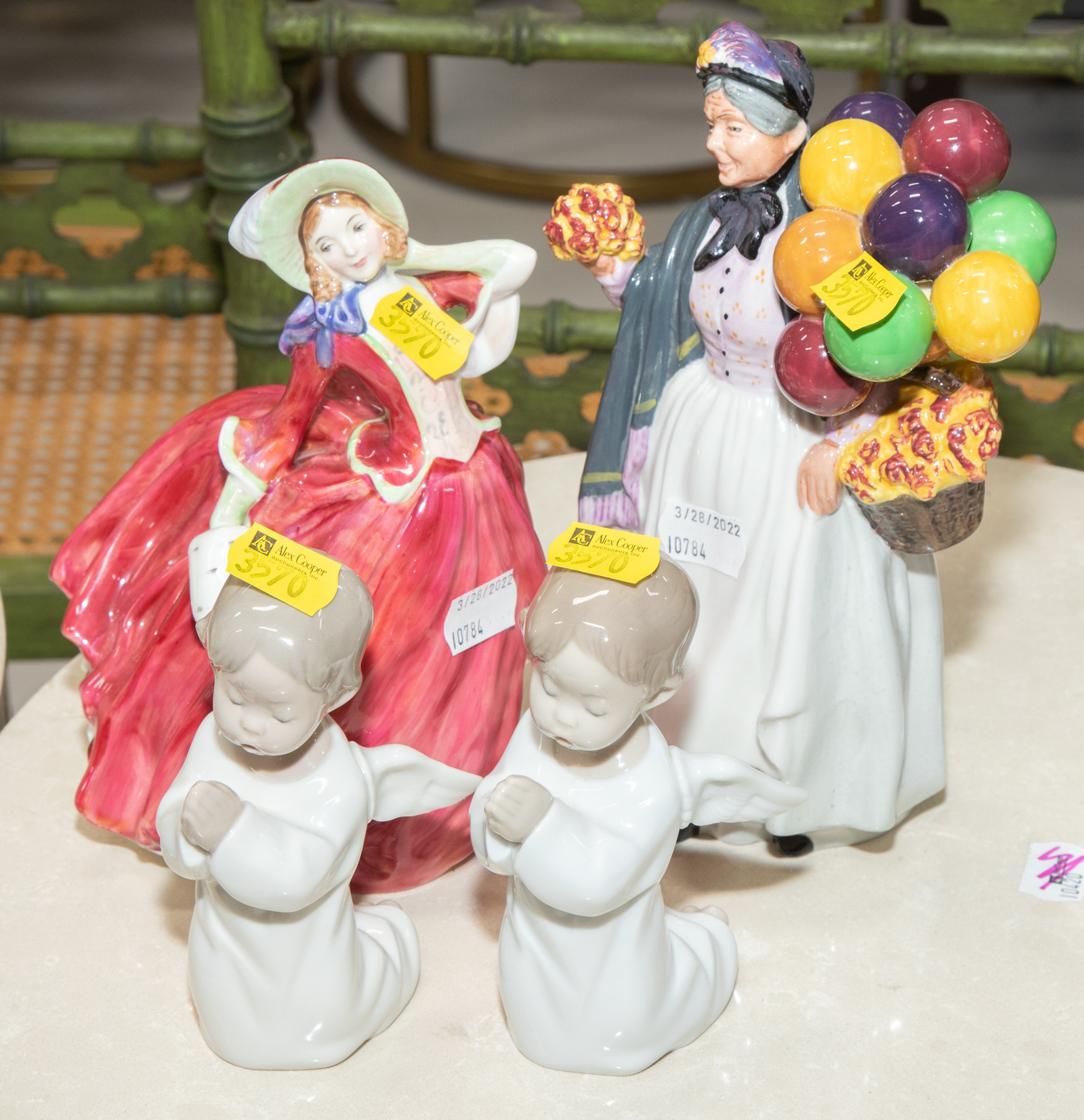 Appraisal: TWO LLADRO TWO ROYAL DOULTON FIGURES Includes Autumn Breezes in