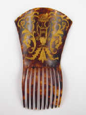 Appraisal: A large tortoiseshell hair comb with engraved and gilt decoration