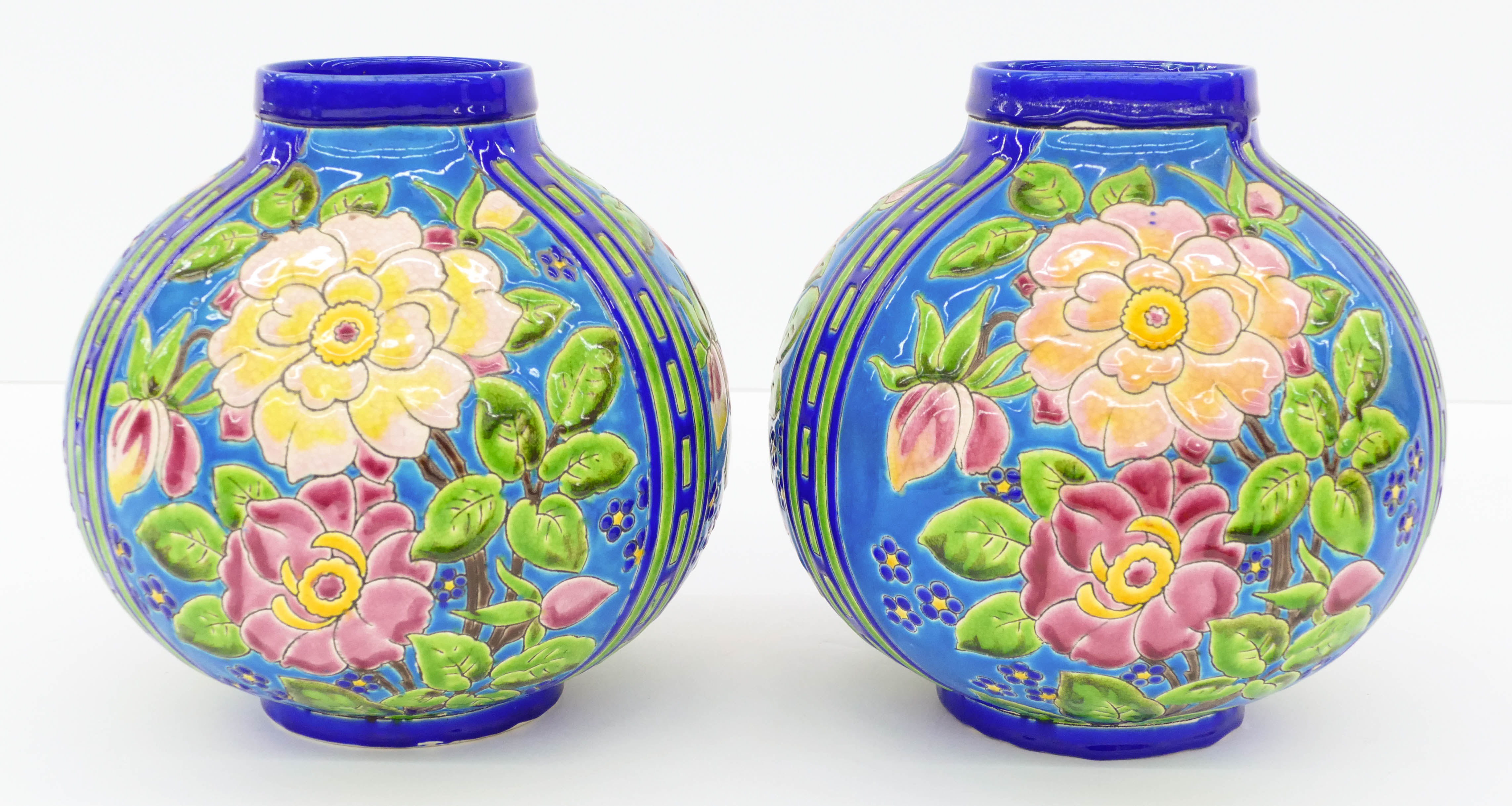 Appraisal: Pair Boch Freres Keramis Floral Ball Vases ''x '' Art