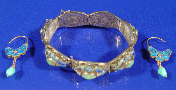 Appraisal: Silver filligree enamel and green stone bracelet and a pair