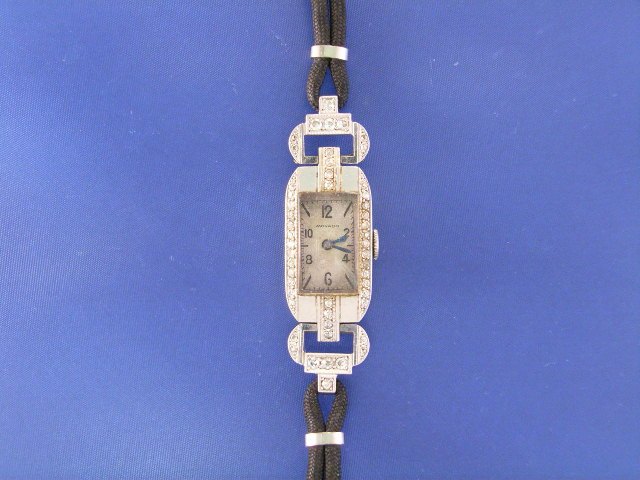 Appraisal: A Movado lady's platinum and diamond set manual cocktail wristwatch