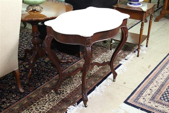 Appraisal: VICTORIAN MARBLE TOP TABLE White turtle shaped top on a