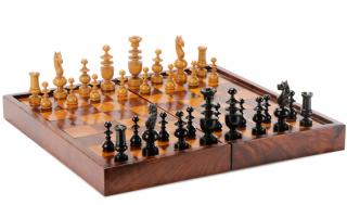 Appraisal: Rosewood Games Box w Regence Style Chessmen A fine late