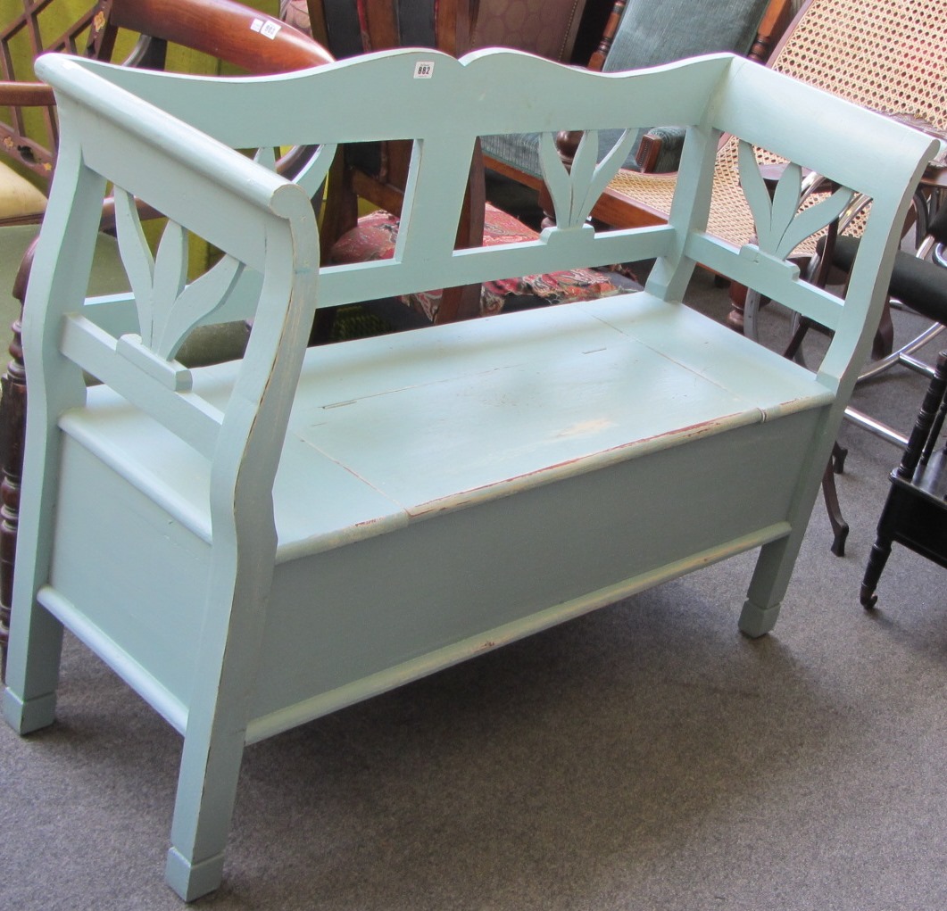 Appraisal: A continental painted pine hall bench with lift top box