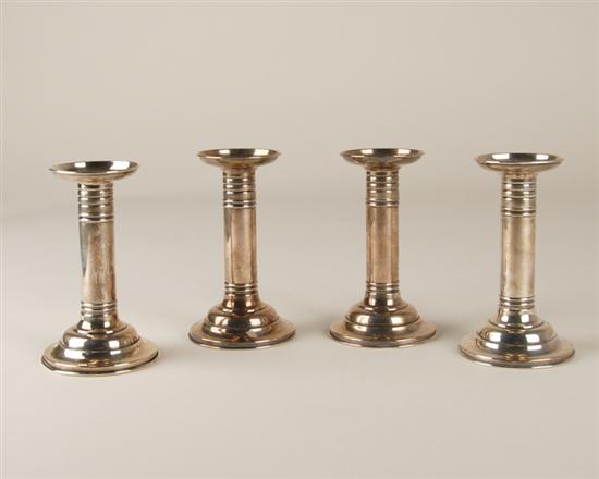 Appraisal: Four Matched Sterling Candlesticks by Meriden Britannia Co in columnar