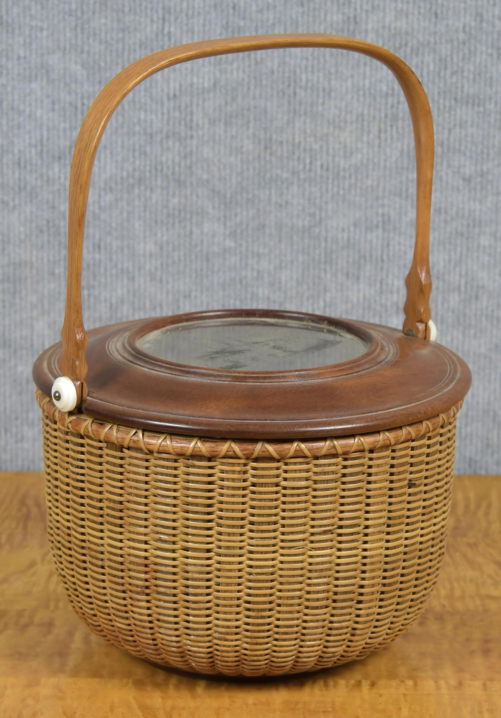 Appraisal: HARRY HILBERT NANTUCKET BASKET A round swing handle nantucket basket