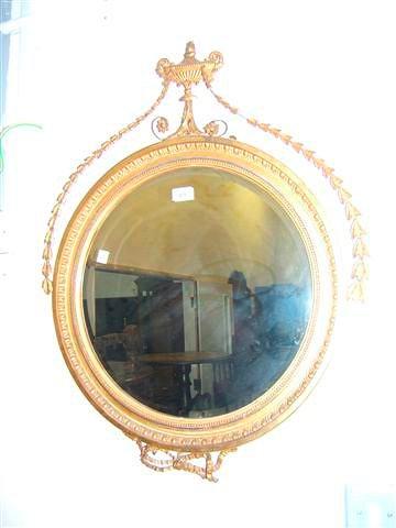 Appraisal: A th Century Regency style gilt wood circular hanging wall