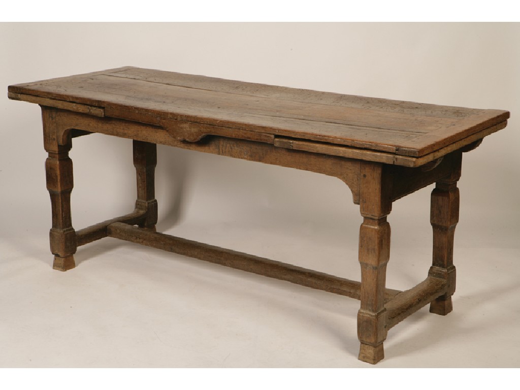 Appraisal: A CONTINENTAL OAK REFECTORY TABLE the plank top with cleated