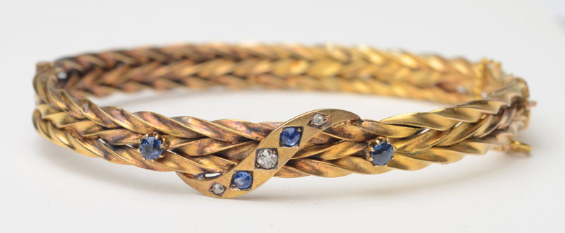 Appraisal: VICTORIAN K GOLD SAPPHIRE AND DIAMOND BANGLE in diam approx