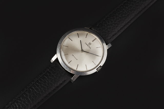 Appraisal: A STAINLESS STEEL DE VILLE WRISTWATCH BY OMEGA the circular