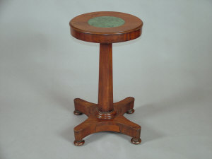 Appraisal: A William IV mahogany circular pedestal occasional table with green