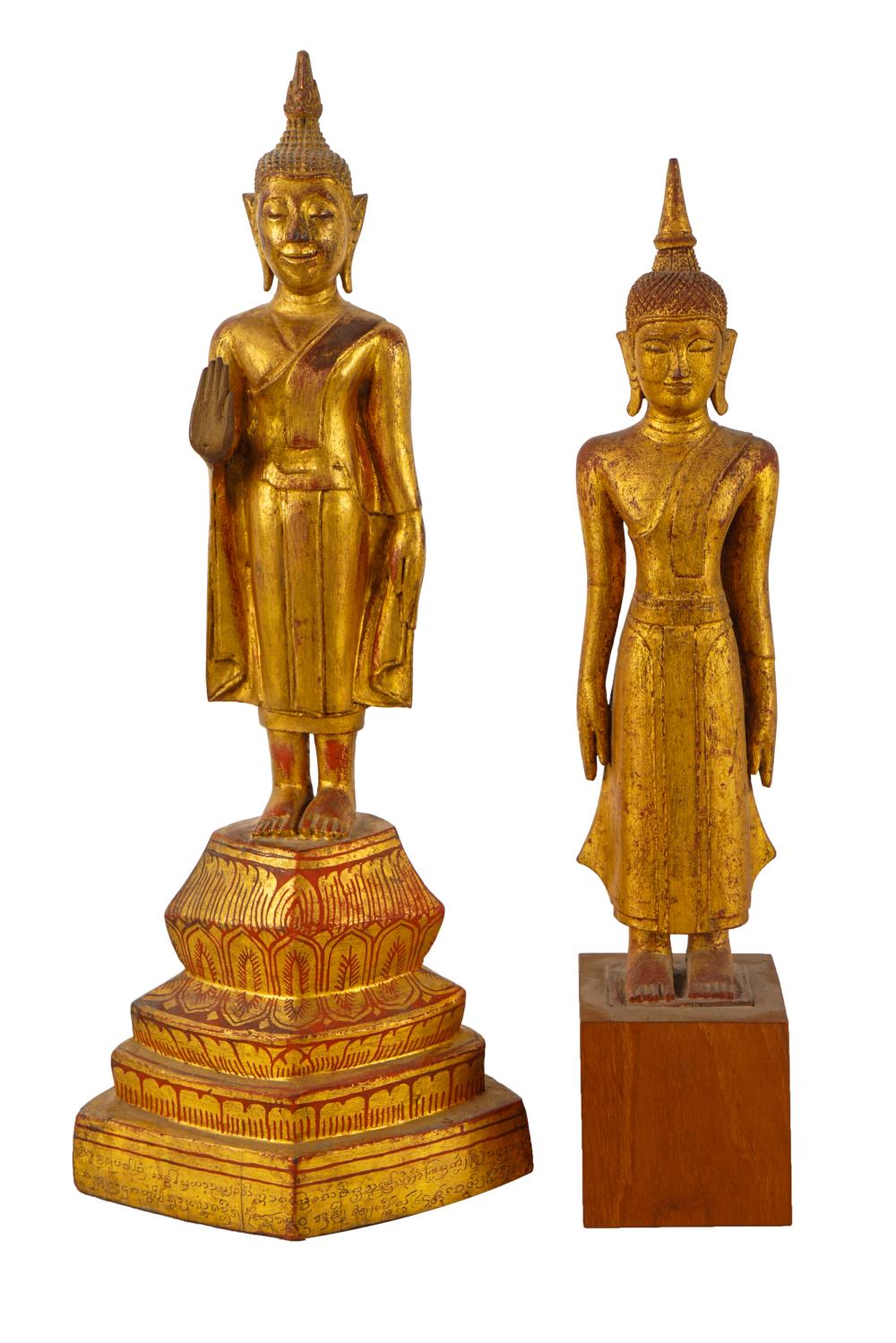 Appraisal: TWO THAI GILTWOOD BUDDHA FIGURESCondition with cracks and areas of