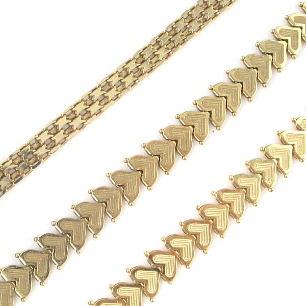 Appraisal: A collection of two gold neck chains and one bracelet