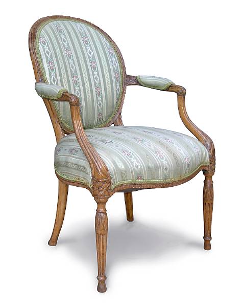 Appraisal: A George III beechwood upholstered open armchair late th century