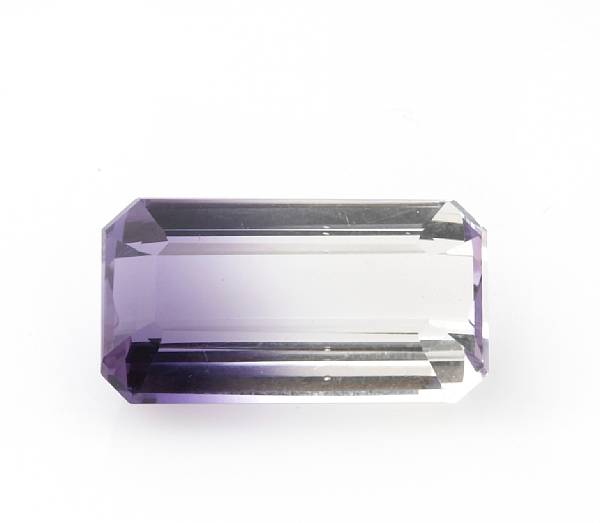 Appraisal: Bi-Color Amethyst Bolivia A bi-color rectangular-cut stone which displays zoning