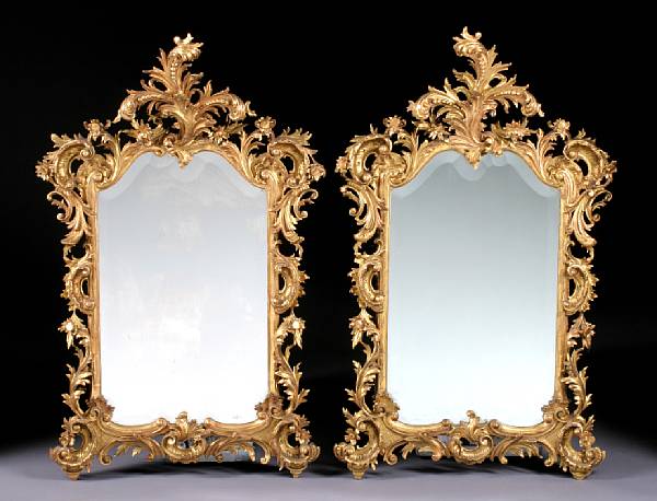 Appraisal: A pair of Italian Rococo style giltwood mirrors late th