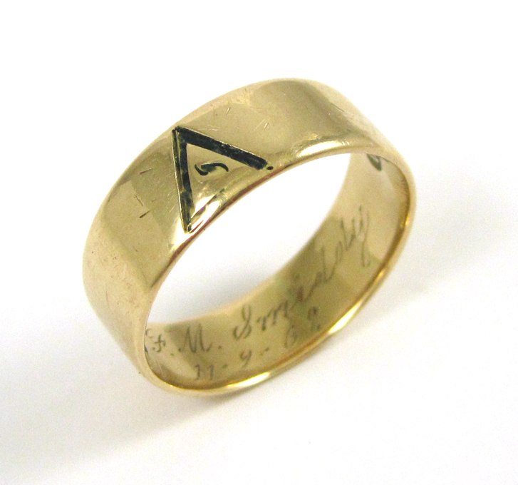 Appraisal: MASONIC FOURTEEN KARAT GOLD WEDDING BAND weighing grams The inside