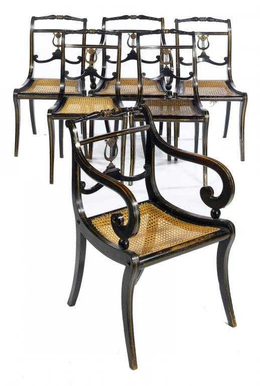 Appraisal: A SET OF SIX GEORGE IV EBONISED AND GILT DINING