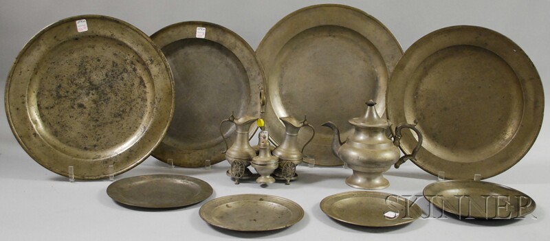 Appraisal: Four Pewter Chargers a Teapot Caster Set and Four Plates