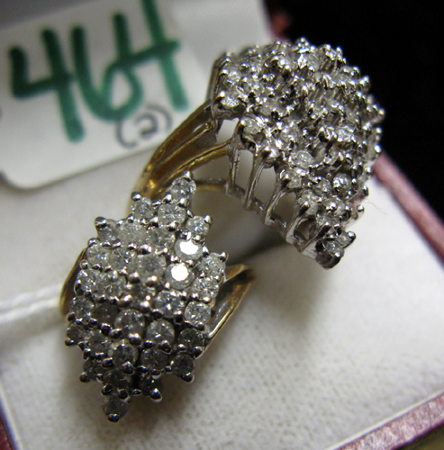 Appraisal: TWO DIAMOND AND YELLOW GOLD CLUSTER RINGS each set with