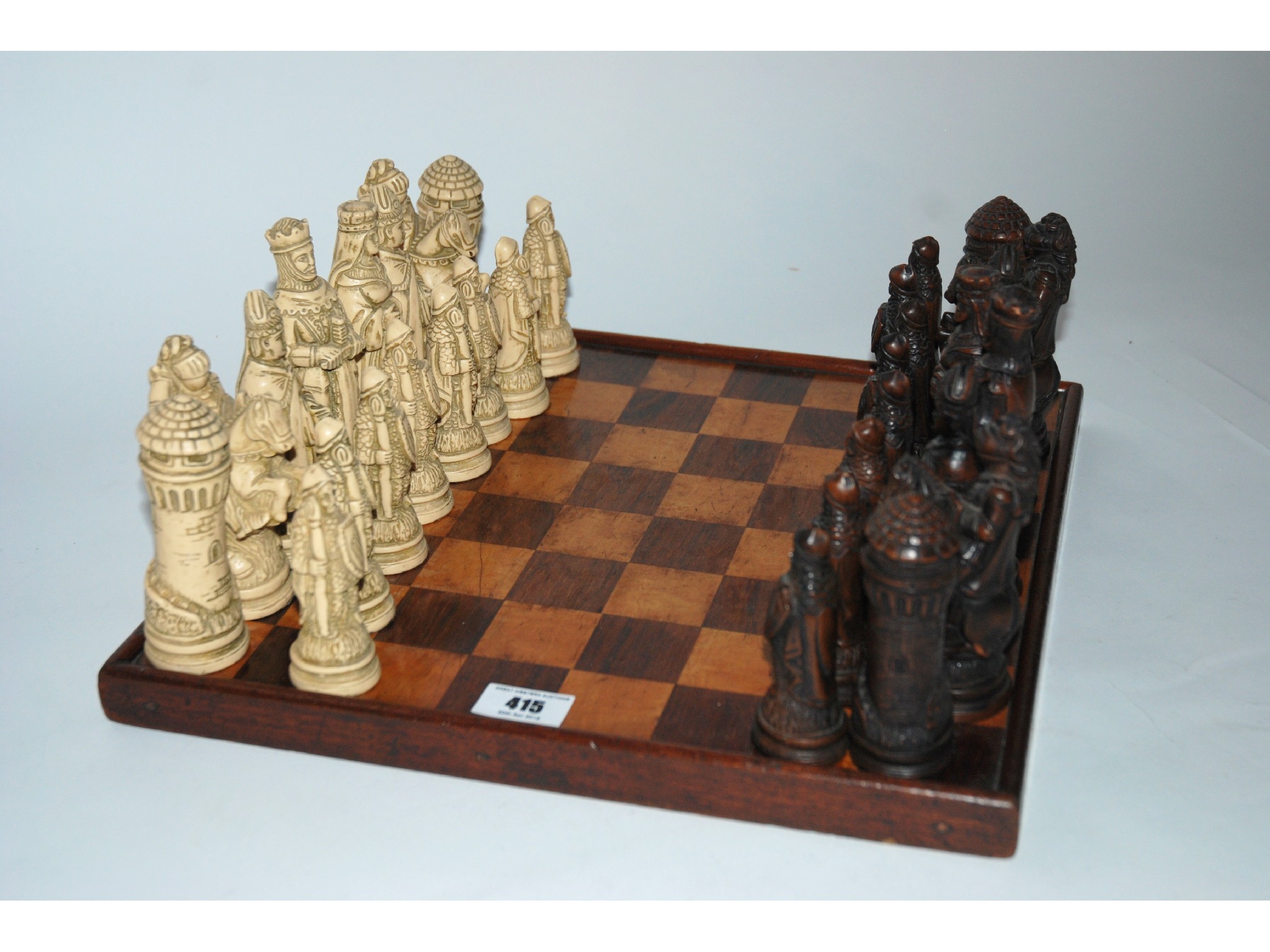 Appraisal: A Camelot style chess set with chess board