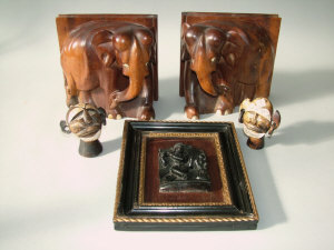 Appraisal: A pair of Asian hardwood bookends carved as elephants height